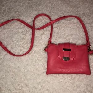 Coral colored small wallet/purse with long strap